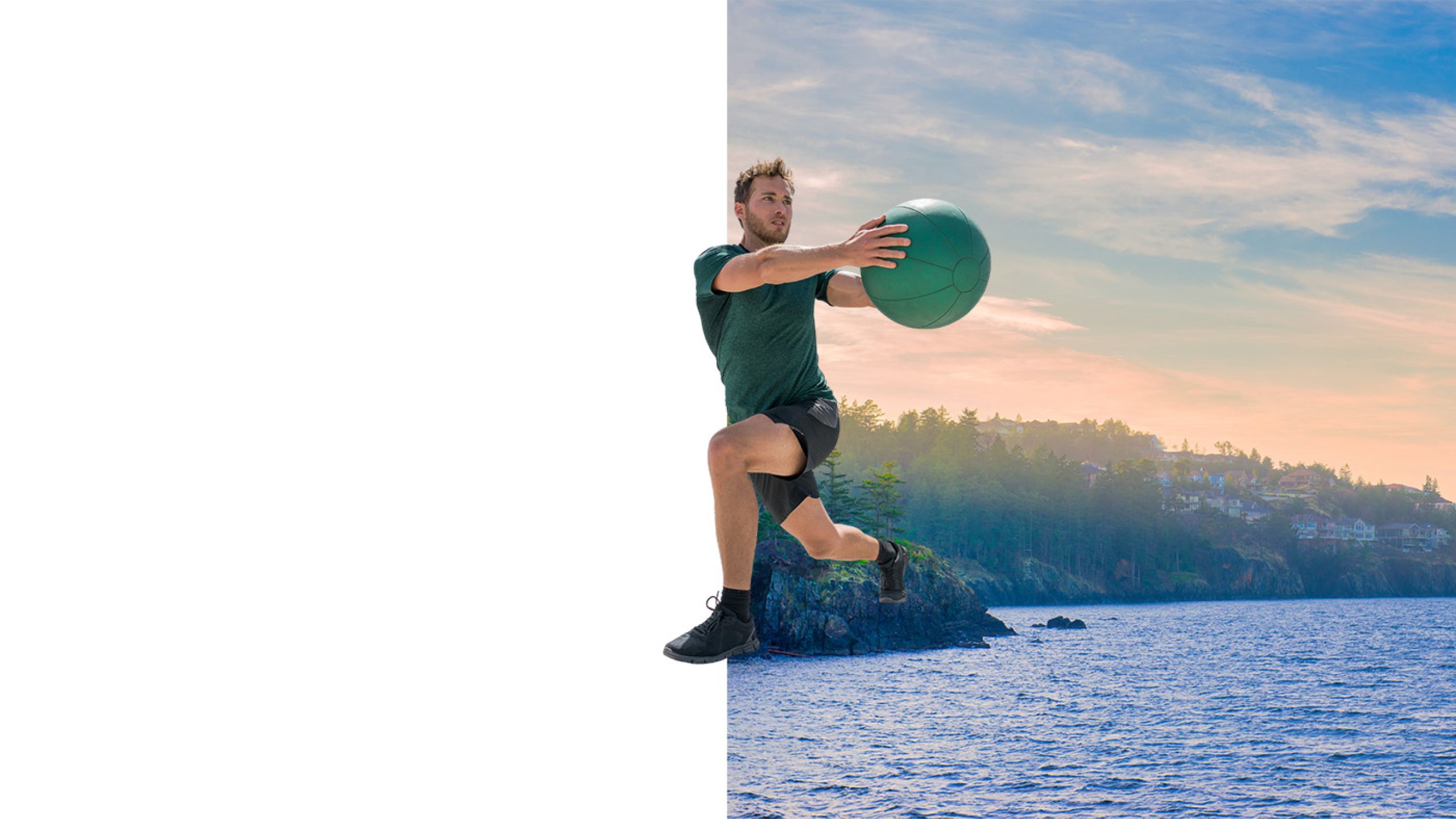 Athlete with Medicine ball with Vancouver Island shoreline in the background - Upstream Athletics